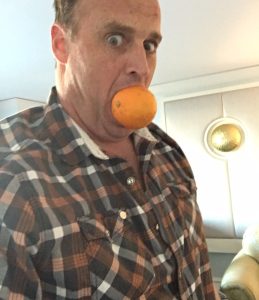 Matt Eating an Orange